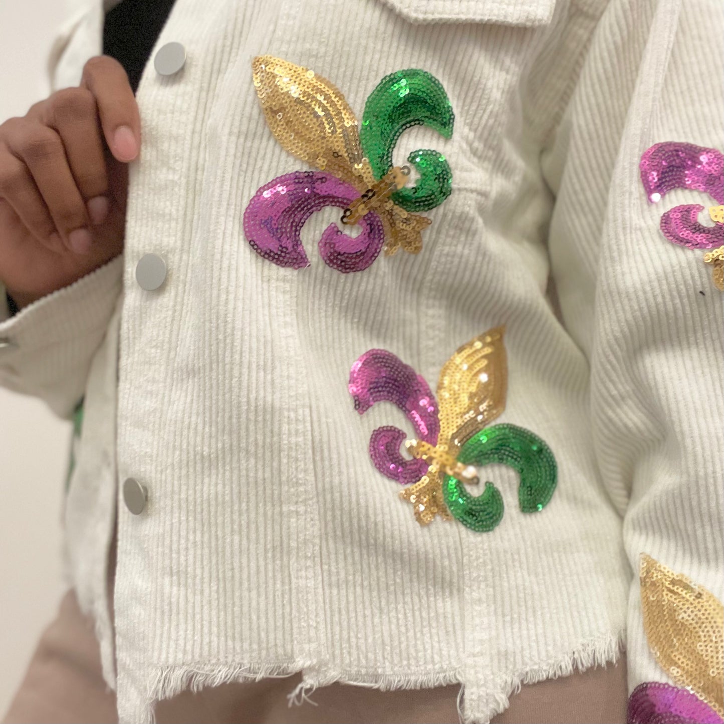 white sequin fleur de lis jacket