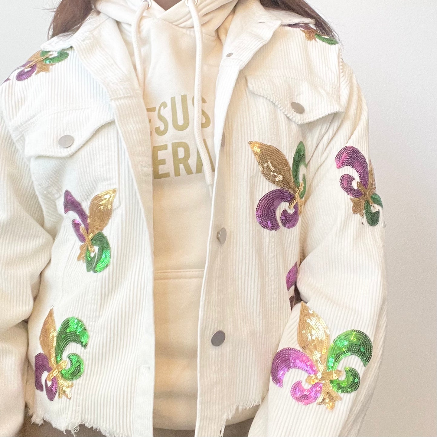 white sequin fleur de lis jacket