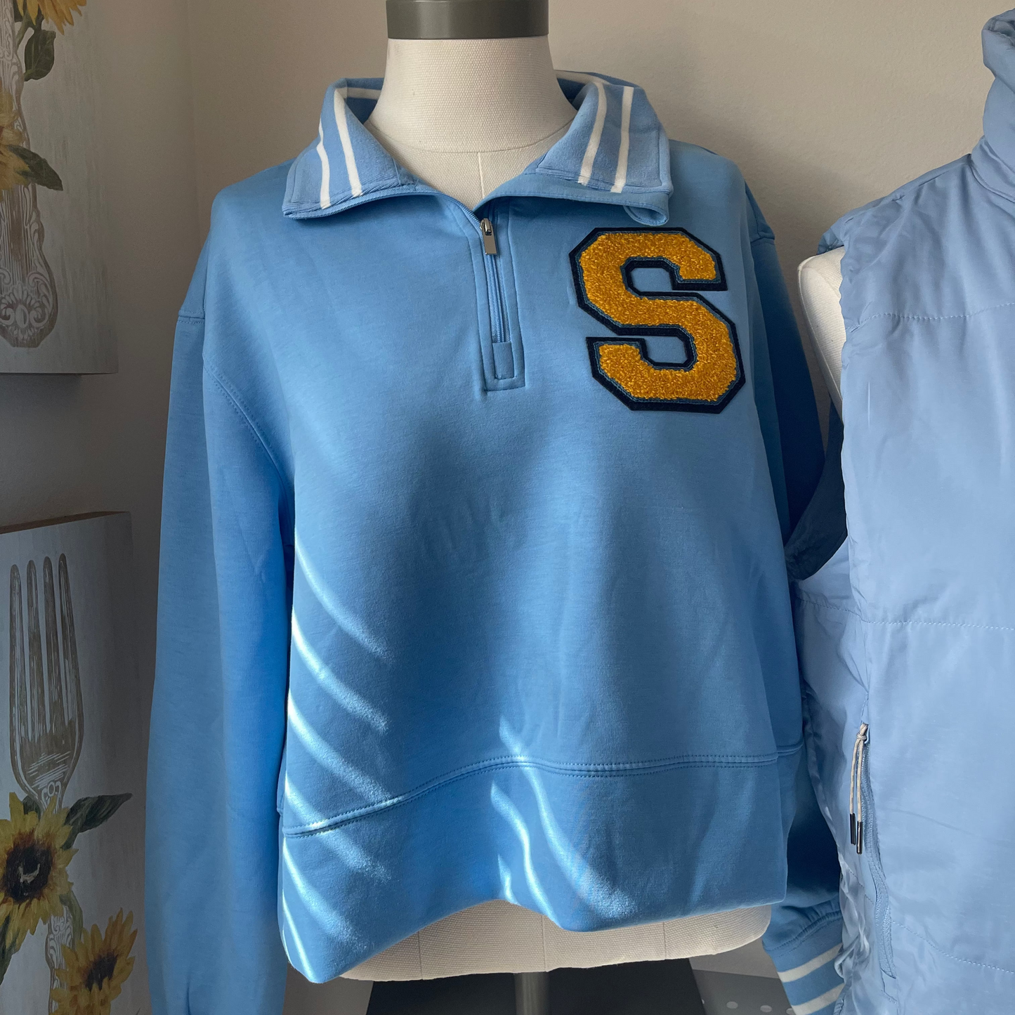 light blue "S" stripe cropped quarter zip