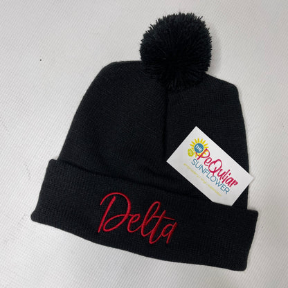 Delta pom beanie