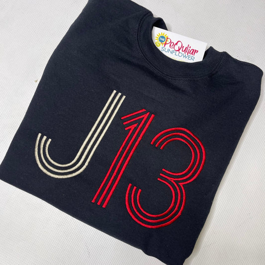 J13